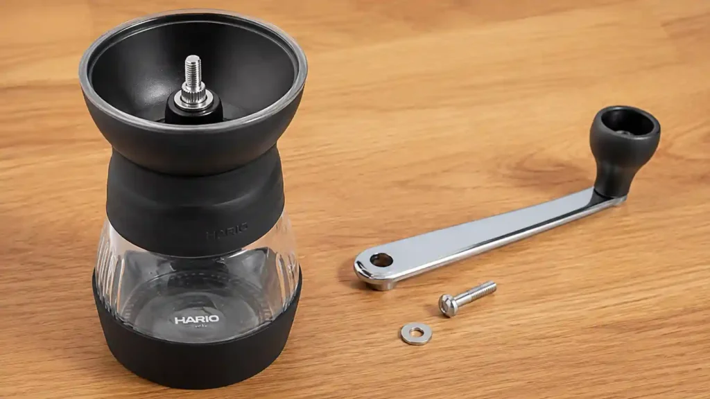 Detaching the handle bolt on the Hario Skerton Pro before cleaning