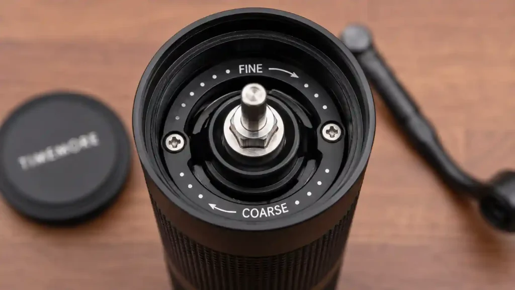 Hario coffee grinder adjustment nut at top of burr shaft